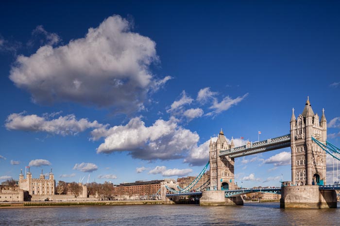 Tower Bridge and the Tower of London on a bright spring day.