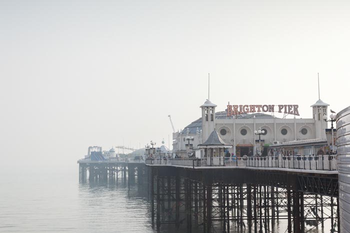 Brighton Pier on a soft, warm, foggy spring day, Sussex, England.