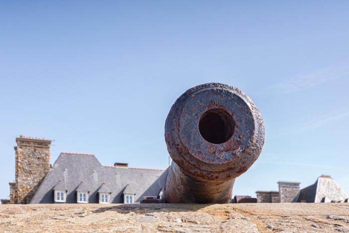 Cannon peeping over the ramparts at Saint Malo, Brittany, France.