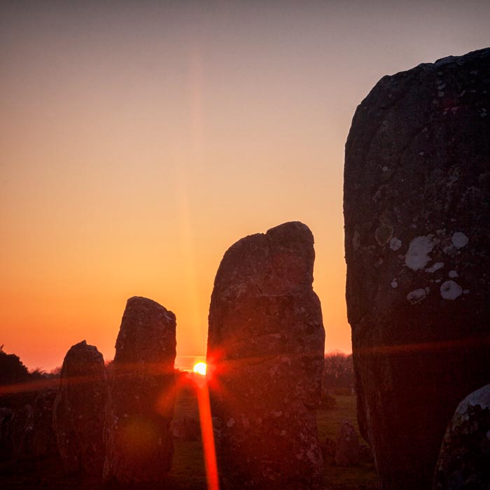 Sunrise at Carnac Alignments, Brittany, France.
