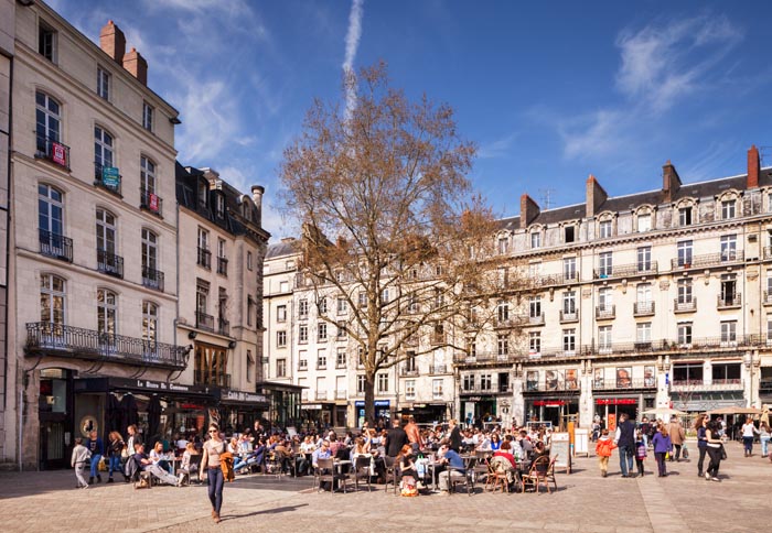 Outdoor cafe in the Place du Commerce, Nantes, Loires Atlantique, France.