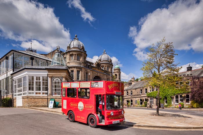Sightseeing 'tram' departing from Buxton Opera House, Buxton, Derbyshire, England