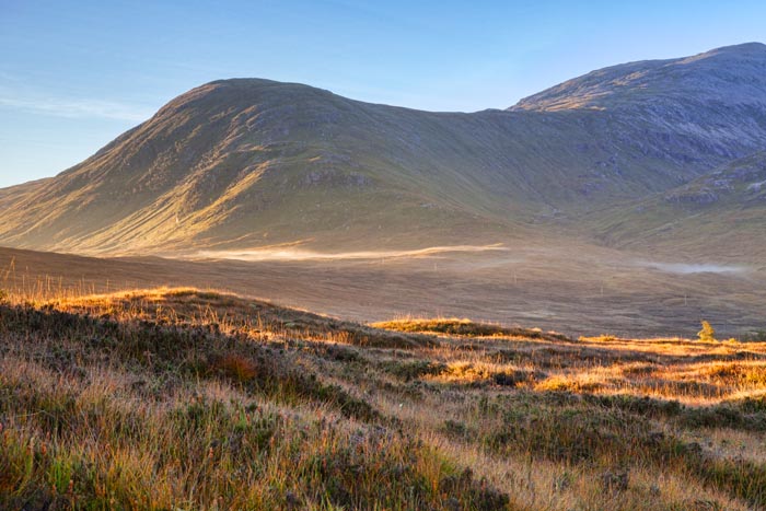 Glencoe at sunrise, in autumn, Lochaber, Highlands, Scotland, UK.