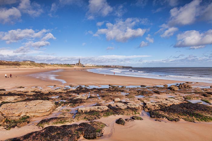 The beach at Tynemouth on a bright spring day, Tyne and Wear, England, UK