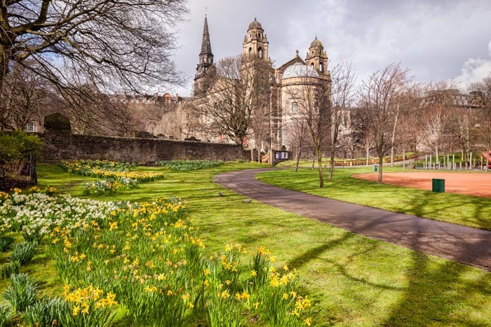 Spring in West Princes Street Gardens, Edinburgh, looking towards St Cuthbert's Parish Church.