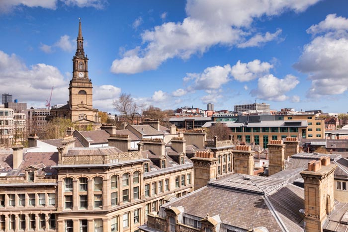 A view over the roof tops to All Saints Church, Newcastle-upon-Tyne, Tyne and Wear, England, UK