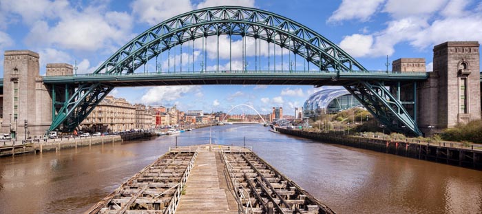 The Tyne Bridgefrom the Swing Bridge in Newcastle-upon-Tyne, Tyne and Wear, England, UK. The Gateshead Millennium Bridge and Sage music venue are visible behind.