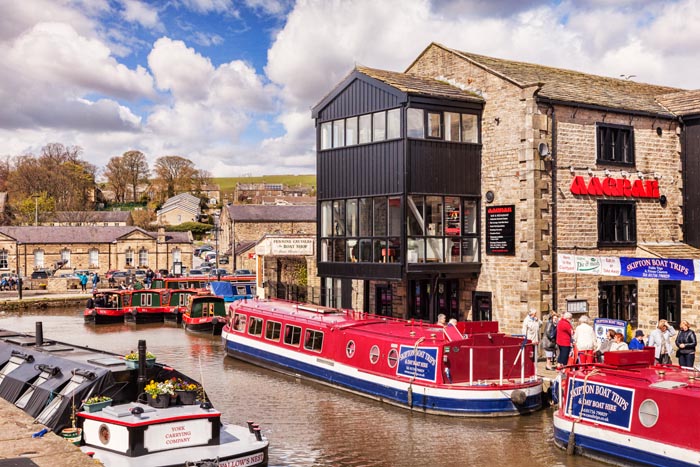 Narrowboats on the Leeds and Liverpool Canal at Skipton, North Yorkshire, England, UK