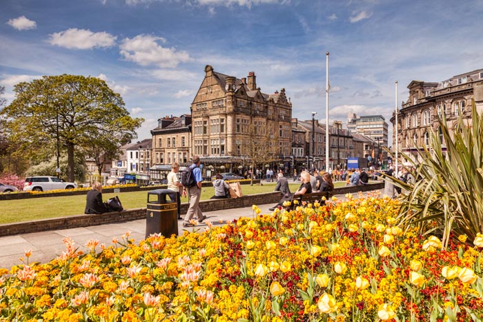 A view of Harrogate on a bright spring day, with Betty's Tea Rooms in the background. North Yorkshire, England, UK.