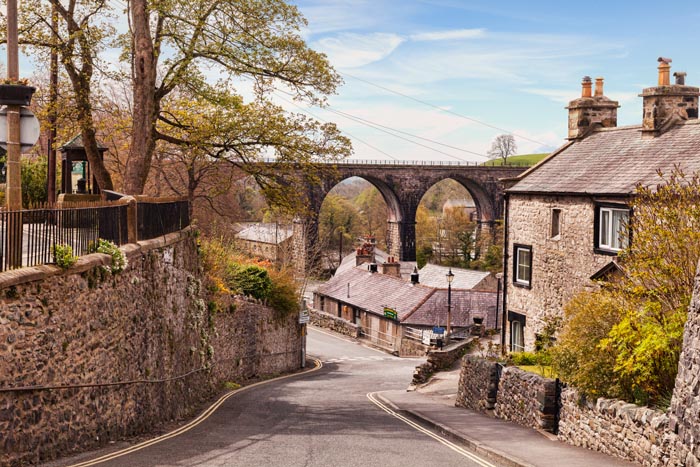 The village of Ingleton, with its cottages and railway viaduct, Yorkshire Dales National Park, North Yorkshire, England, UK
