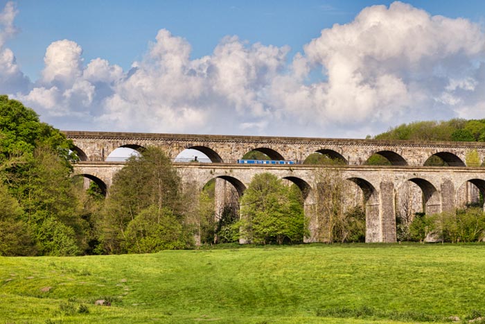 Chirk Aqueduct and Viaduct, with a narrowboat crossing the aqueduct, Chirk, a World Heritage Site in the County Borough of Wrexham, Wales, UK