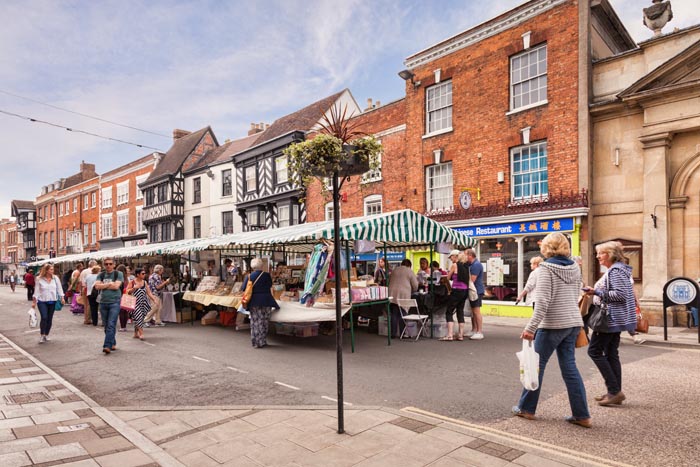 Tewkesbury High Street on market day, Gloucestershire, England, UK