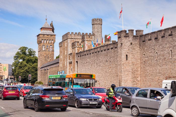 27 June 2016: Cardiff, Wales, UK - Traffic alondgside Cardiff Castle, Cardiff, Wales, UK