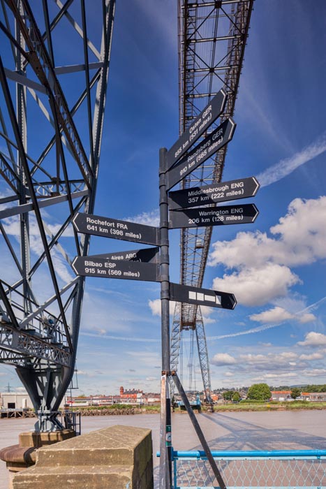 Sign at the Transporter Bridge, Newport, Gwent, South Wales, showing distances to the other transporter bridges still standing in the world today,