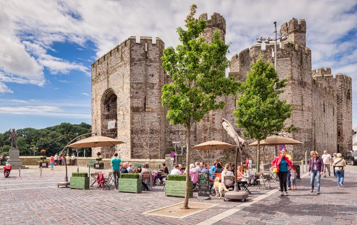 Caernarfon Castle from Castle Square, Caernarfon, Gwynedd, Wales, UK