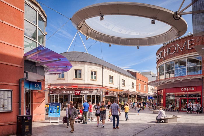 Shoppers in Risman Place, Workington, Cumbria, England.