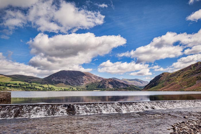 Weir at Ennerdale Water, in the Lake District National Park, Cumbria, England, UK.