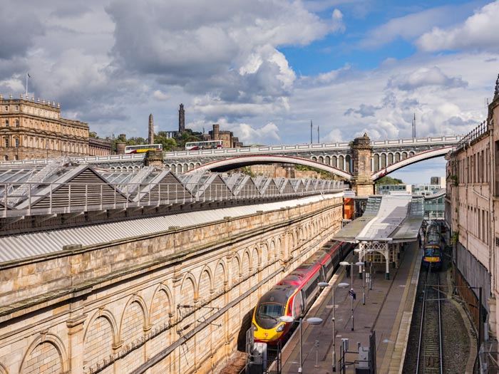 Virgin train in Waverley Street Station, Edinburgh, Scotland, UK, seen from above.