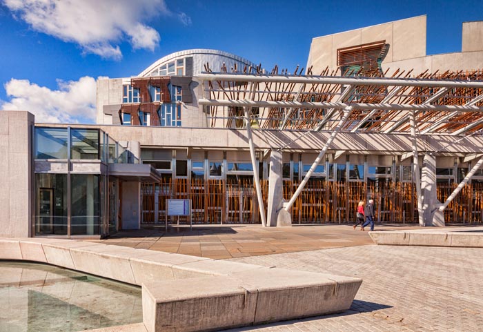 Scottish Parliament building in bright autumn sunshine, Edinburgh, Scotland, UK