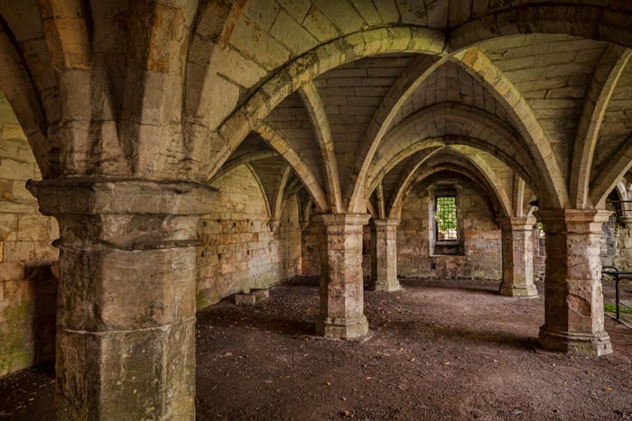 The undercroft of St Leonard's Hospital in Museum Gardens, York, North Yorkshire, England, UK.