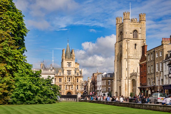 Kings Parade, Cambridge, in early autumn. Great St Mary's Church, Trinity College, the Senate House and Kings College can be seen.