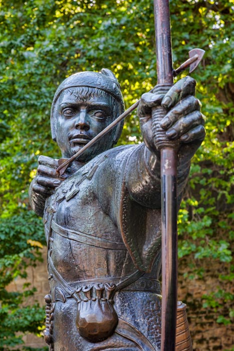 Statue of Robin Hood by James Woodford, near Nottingham Castle, England, UK